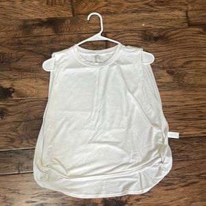 Athleta xs white tank top with open sides.